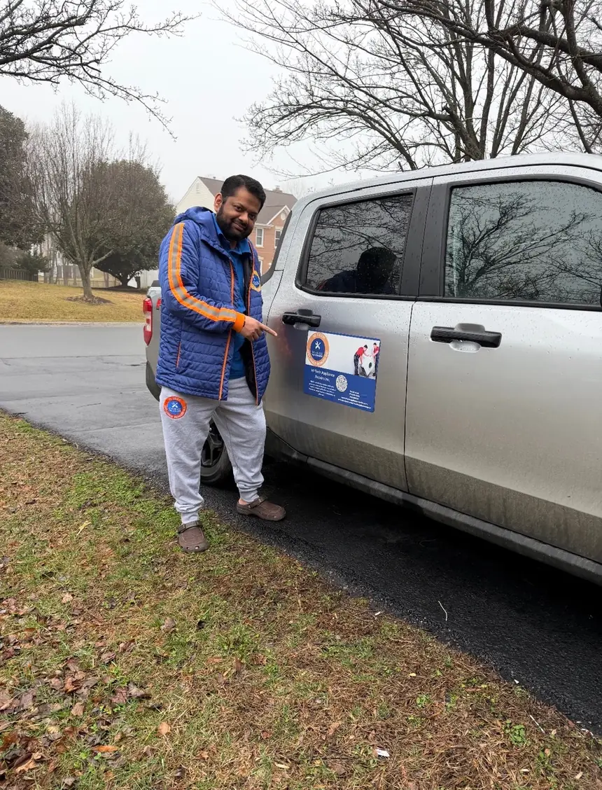 Hi-Tech Appliance Repairs service truck with branded magnet in Northern Virginia